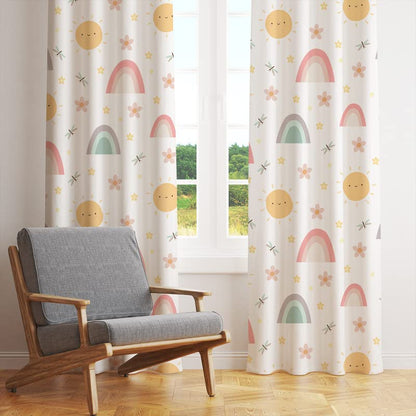 A vibrant curtain adorned with a sun, flowers, and stars, adding a burst of color and whimsy to any space.