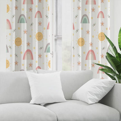 A vibrant curtain adorned with a sun, flowers, and stars, adding a burst of color and whimsy to any space.