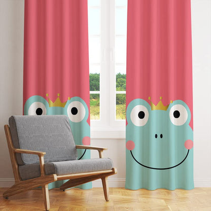 A cartoon frog wearing a crown, suspended from a curtain.