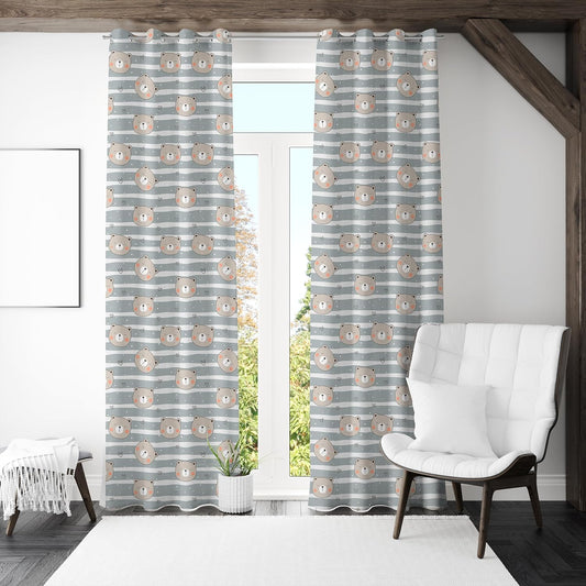 A curtain displaying grey and white stripes with a bear pattern integrated into the design.