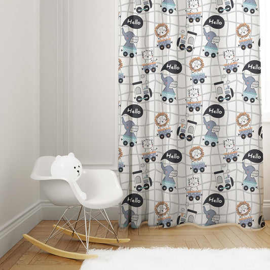 A charming baby elephant curtain with a delightful cartoon animal theme, enhancing the festive ambiance of the celebration.