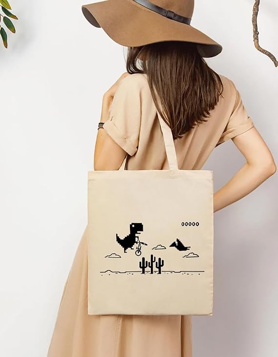 Women Holding Cool dino print cotton duck tote bag