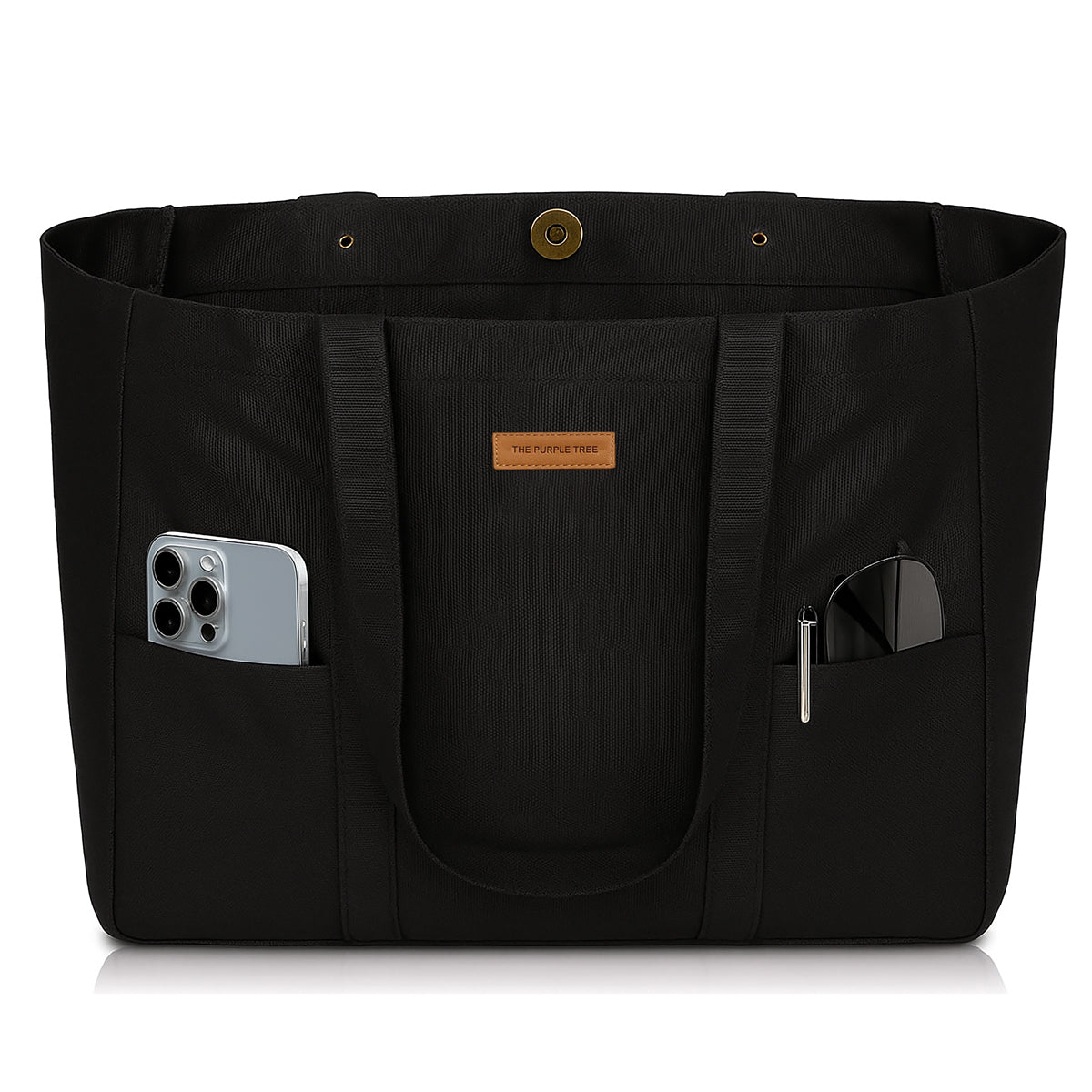 Black tote bag with pockets and a phone inside on a white background