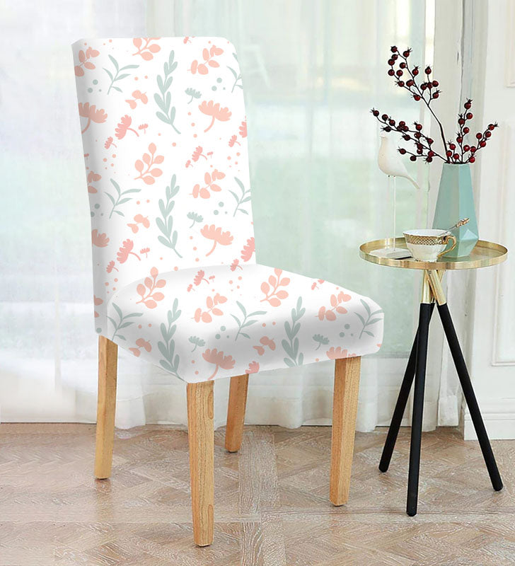  A chair with a beautiful floral pattern, adding a touch of elegance to any room decor.