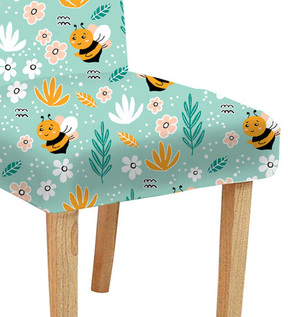 Bee print chair covers: Vibrant yellow covers adorned with black bees, adding a playful touch to any chair.