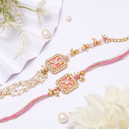 Add a touch of glamour to your ensemble with this stunning pink and gold Rakhi embellished with pearls.