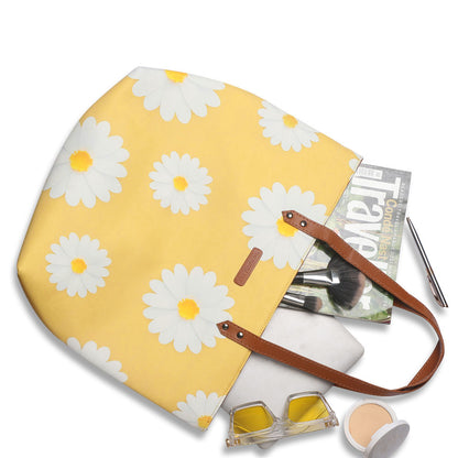 Chic yellow tote bag with white daisies pattern, a must-have for adding a pop of color to your ensemble.
