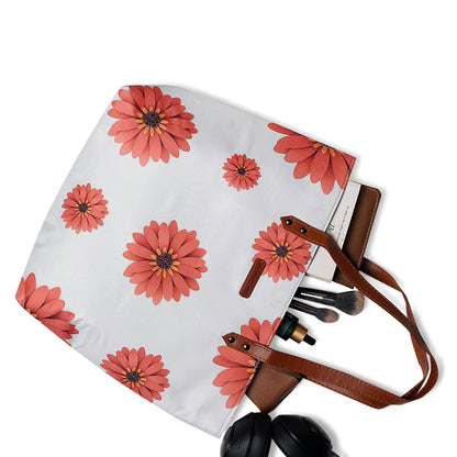 Cute orange kitty with bright eyes staring out the window on a sunny day.