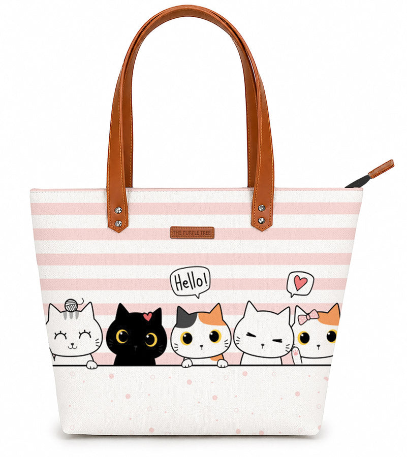 Tote bag with cartoon cats design on a white background