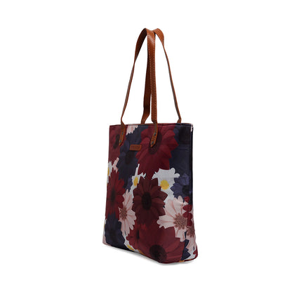 Eye-catching tote bag with a beautiful floral design, a versatile piece for any casual or dressy occasion.