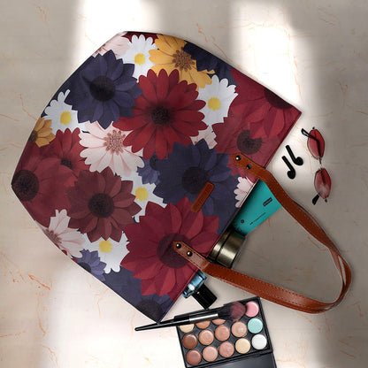 A stylish tote bag with a vibrant floral print, perfect for carrying your essentials.