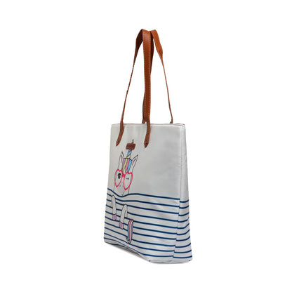 Fashionable white tote bag with a cute unicorn wearing glasses, adding a touch of magic to your ensemble