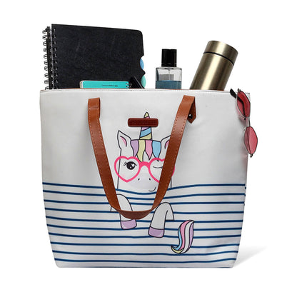 . Stylish white tote bag adorned with a unicorn wearing glasses, adding a fun and trendy element to your look.