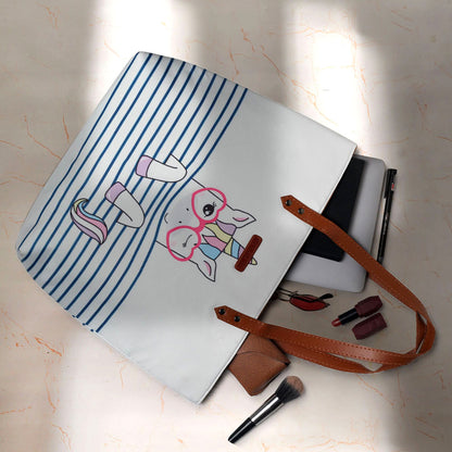 A white tote bag featuring a stylish unicorn wearing glasses.