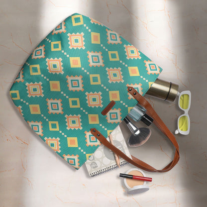  Eye-catching green and yellow tribal pattern tote bag, a trendy addition to your wardrobe.
