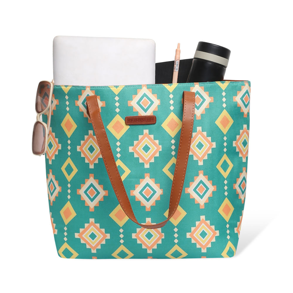 Green and yellow tribal pattern tote bag, perfect for adding a pop of color to your outfit.