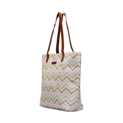 Add a touch of glamour to your ensemble with this stunning pink and gold chevron tote bag.