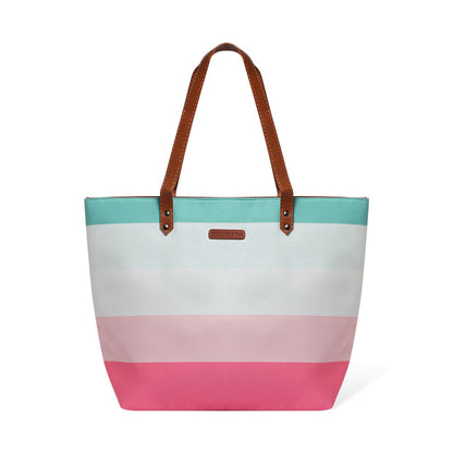 Chic tote bag featuring pink, blue, and white stripes, ideal for adding a pop of color to your outfit.