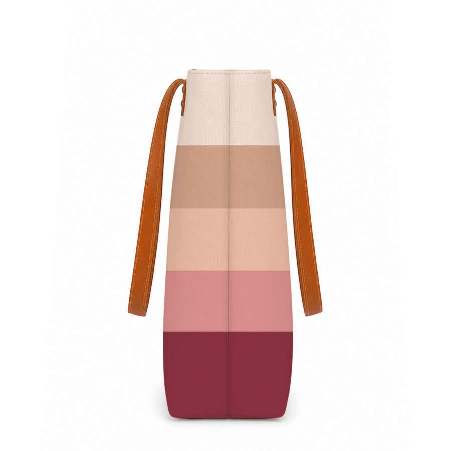 A stylish tote bag with colorful stripes, perfect for carrying all your essentials.
