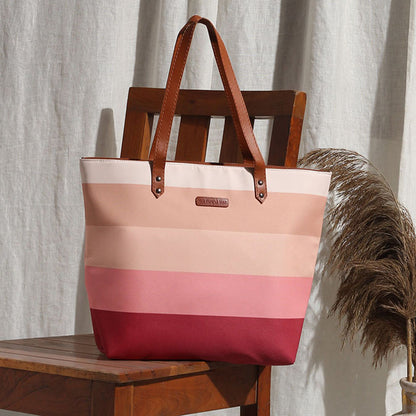 A stylish tote bag with colorful stripes, perfect for carrying all your essentials.