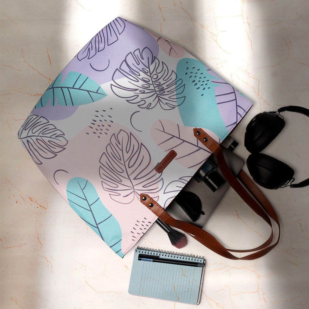Large tote bag featuring a colorful pattern, great for a day out or shopping trip.