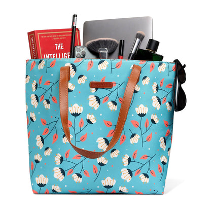 Stylish tote bag with blue and white floral design, ideal for everyday use.