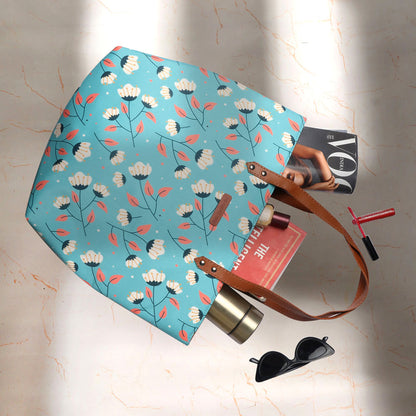 Get ready for summer with this chic blue and white floral print tote bag.