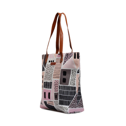 Pink and black tote bag with house pattern