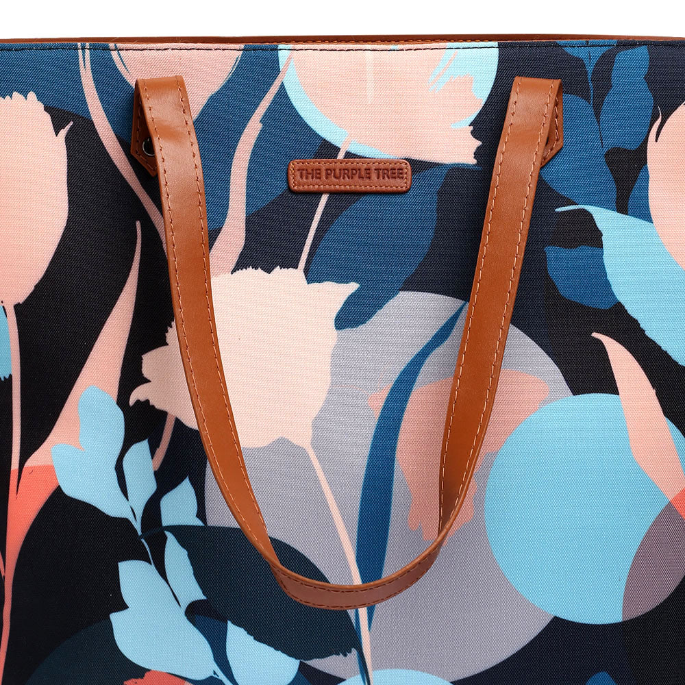Stylish black and blue floral print tote bag, ideal for everyday use.