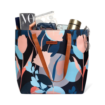  Chic black and blue floral print tote bag, a fashionable accessory.