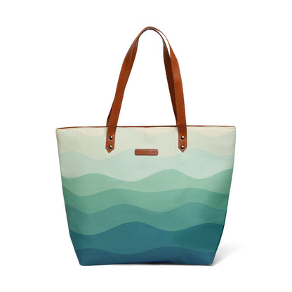 A stylish tote bag with beautiful waves design, perfect for carrying your essentials.