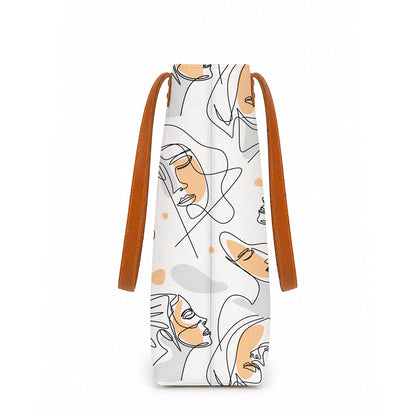 Bag with abstract face design and brown strap on a white background