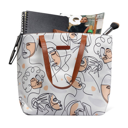 Chic white tote bag featuring a unique design of women's faces.