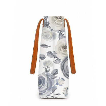 White and blue floral print tote bag, perfect for carrying essentials in style.