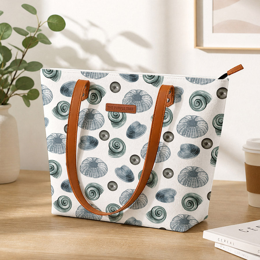 Tote bag with shell pattern on a wooden surface