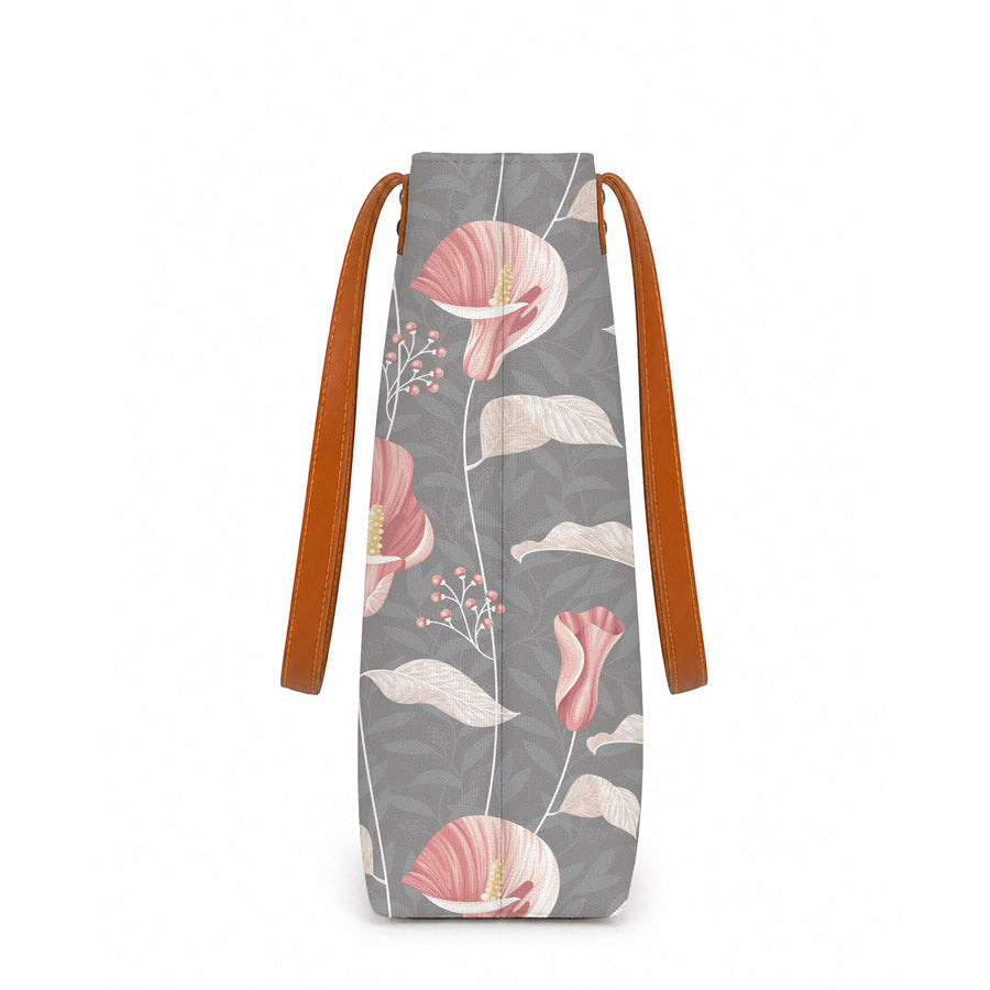 Floral-patterned bag with brown straps on a white background