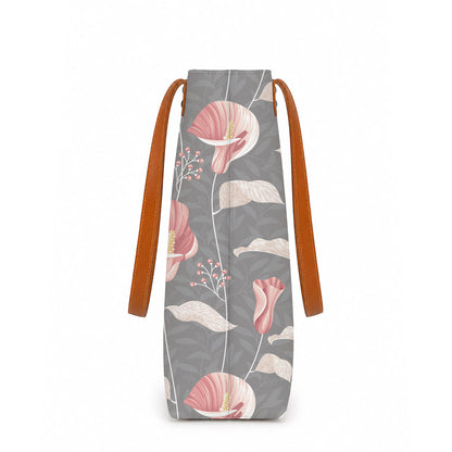 Floral-patterned bag with brown straps on a white background