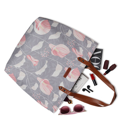 Trendy tote bag featuring a lovely gray and pink floral pattern.