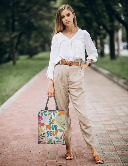 Women carrying Doce bag in bright and colorfull printuments holder fil