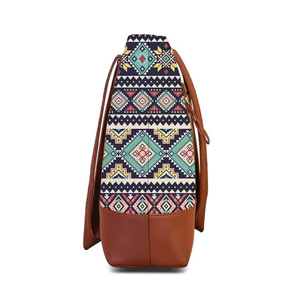 Trendy tribal print tote bag made of leather, complete with a comfortable brown handle for effortless style.