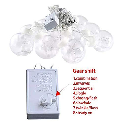 A cozy room showcasing an array of lights suspended from the ceiling, contributing to a cheerful and vibrant environment.
