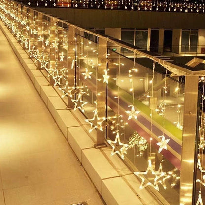 Ceiling adorned with a beautiful string of lights, adding a touch of charm.
