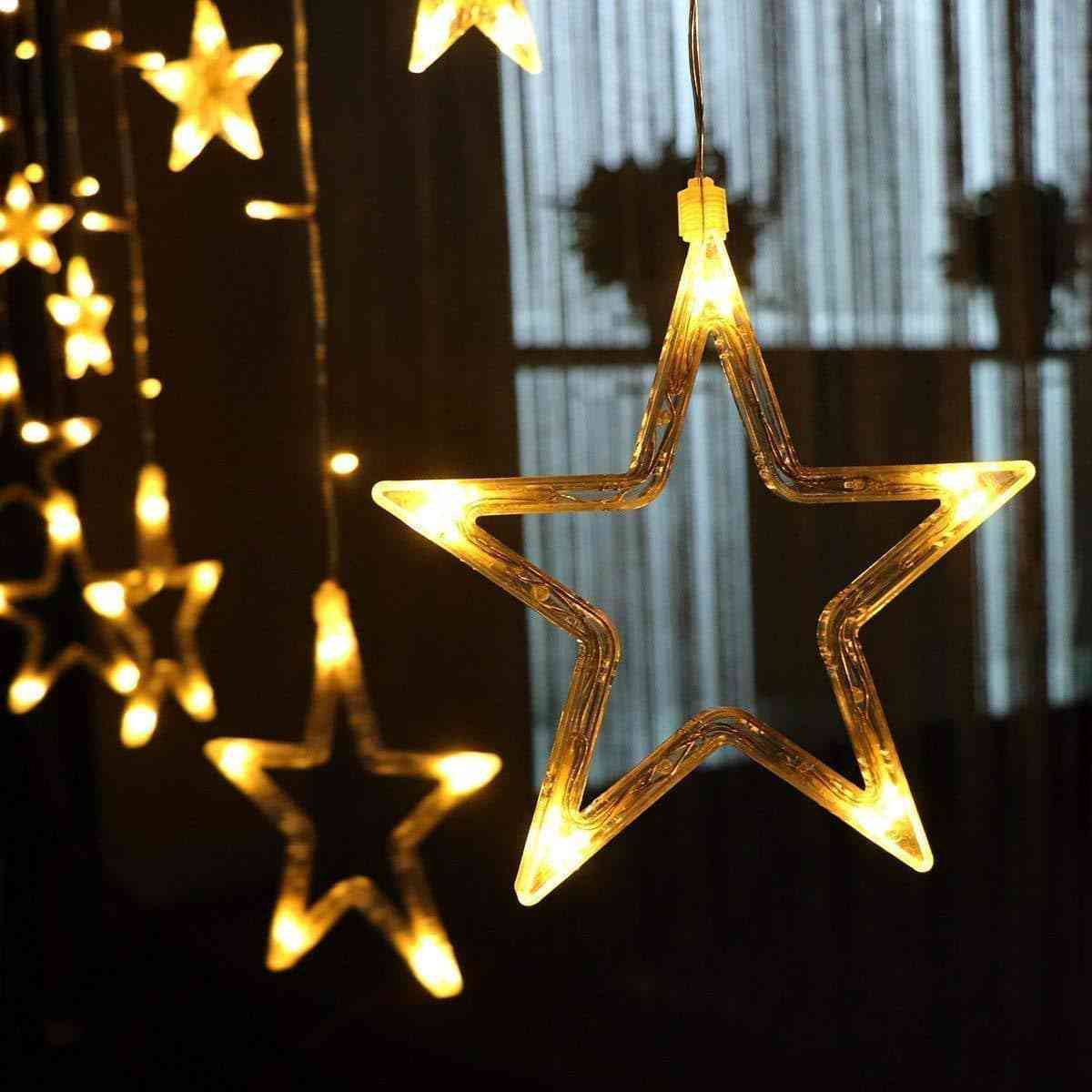 Hanging lights creating a charming and inviting atmosphere in the space.