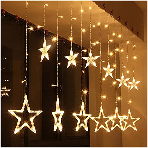  Lights hanging from ceiling, creating a warm glow in the room.