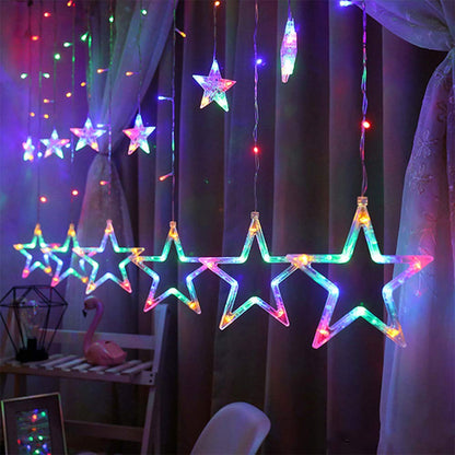 Room ambiance enhanced by a curtain decorated with hanging stars.