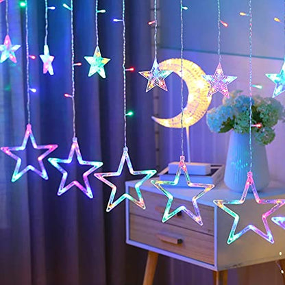 A star and moon hanging from string lights, creating a magical and dreamy atmosphere.