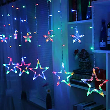  Curtain with stars adds a whimsical touch to the room decor.