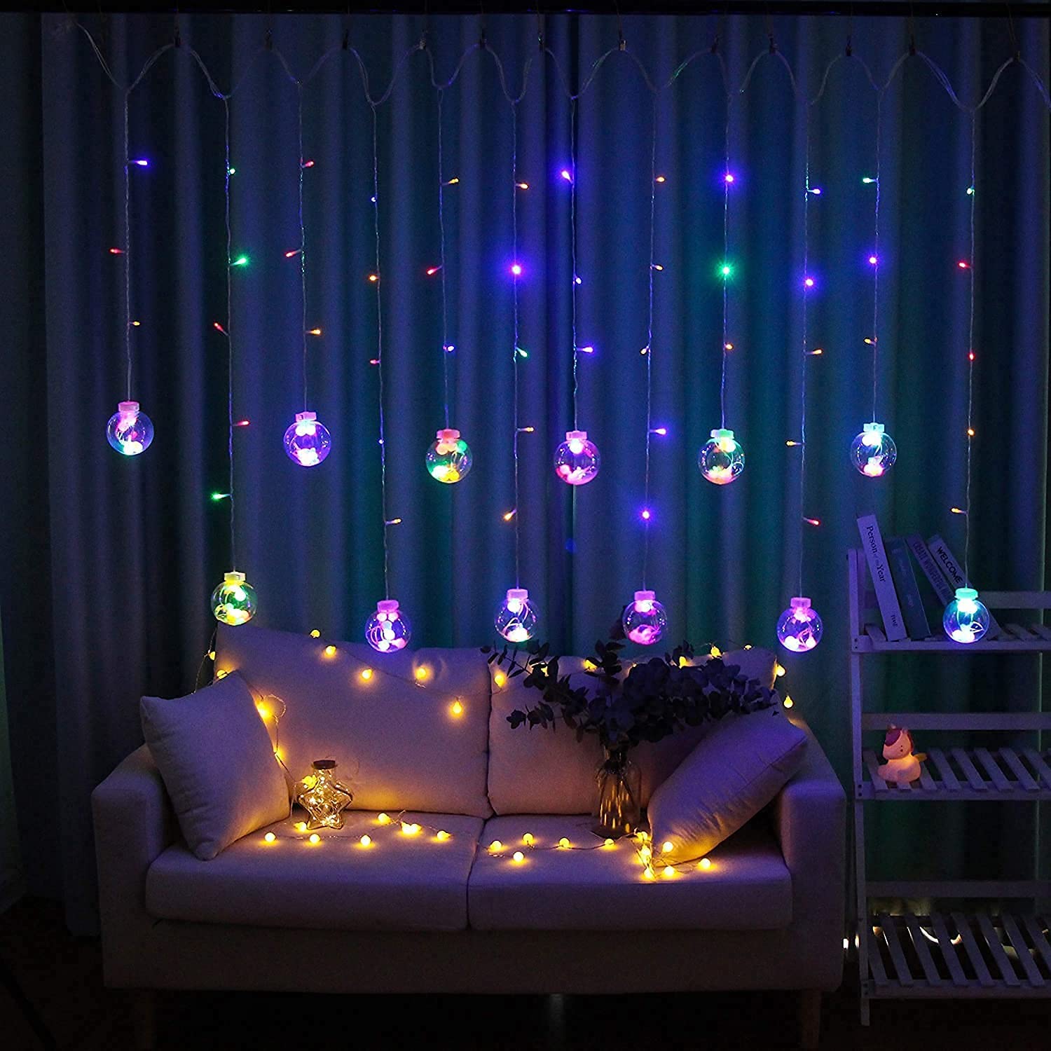Cozy living room with a comfy couch and warm lights.