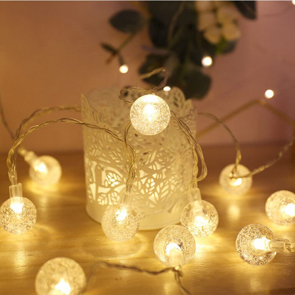 Elegant white ball with a lace overlay, glowing.