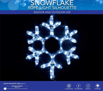 A radiant snowflake glowing against a black background, showcasing its detailed structure and creating a wintery ambiance.